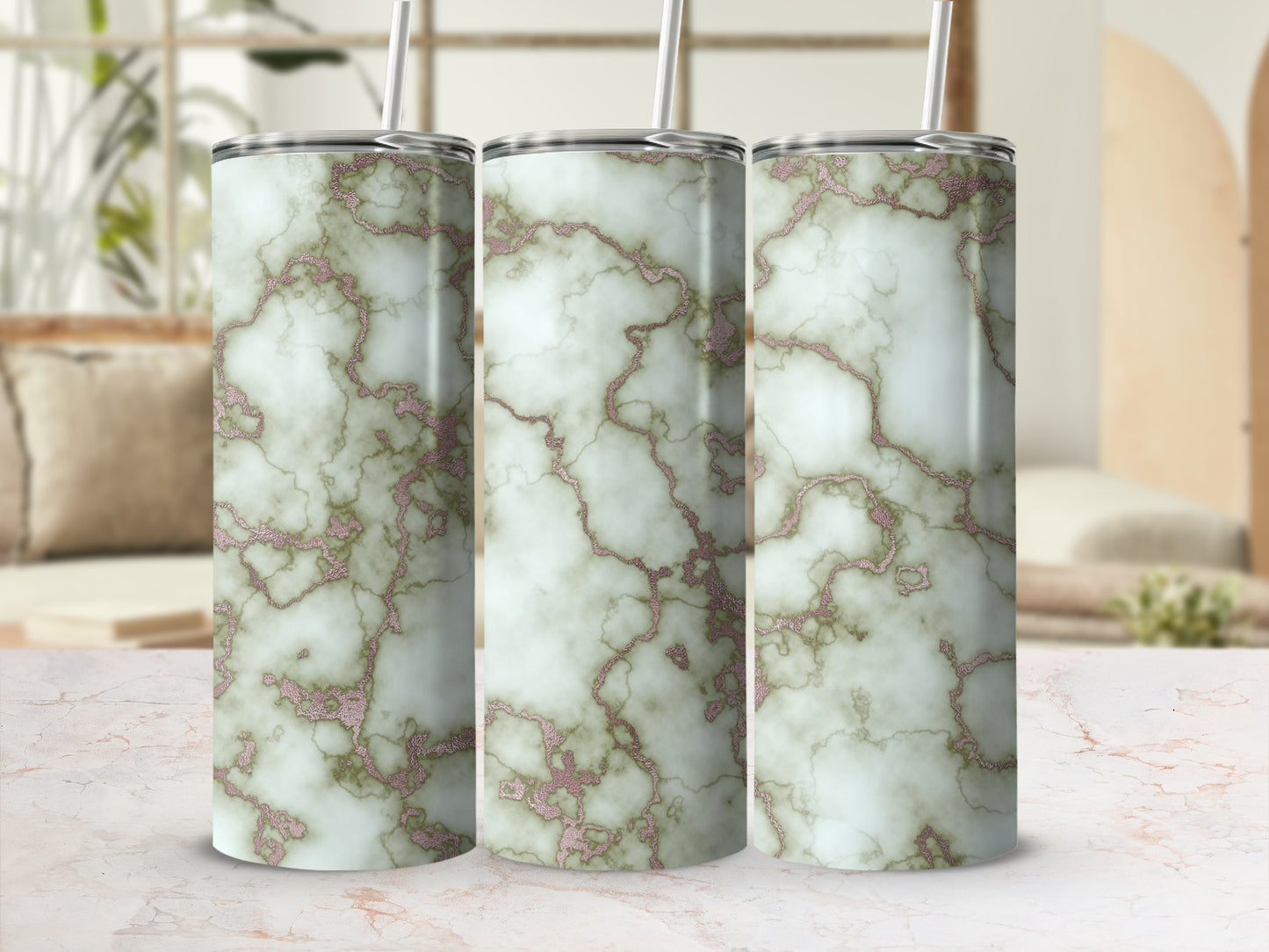 Three tumblers with a marble and rose gold glitter design.