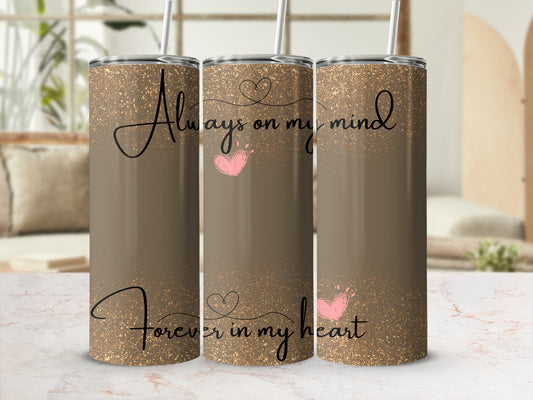 Brown tumbler with glitter and "Always on my mind, Forever in my heart" text.