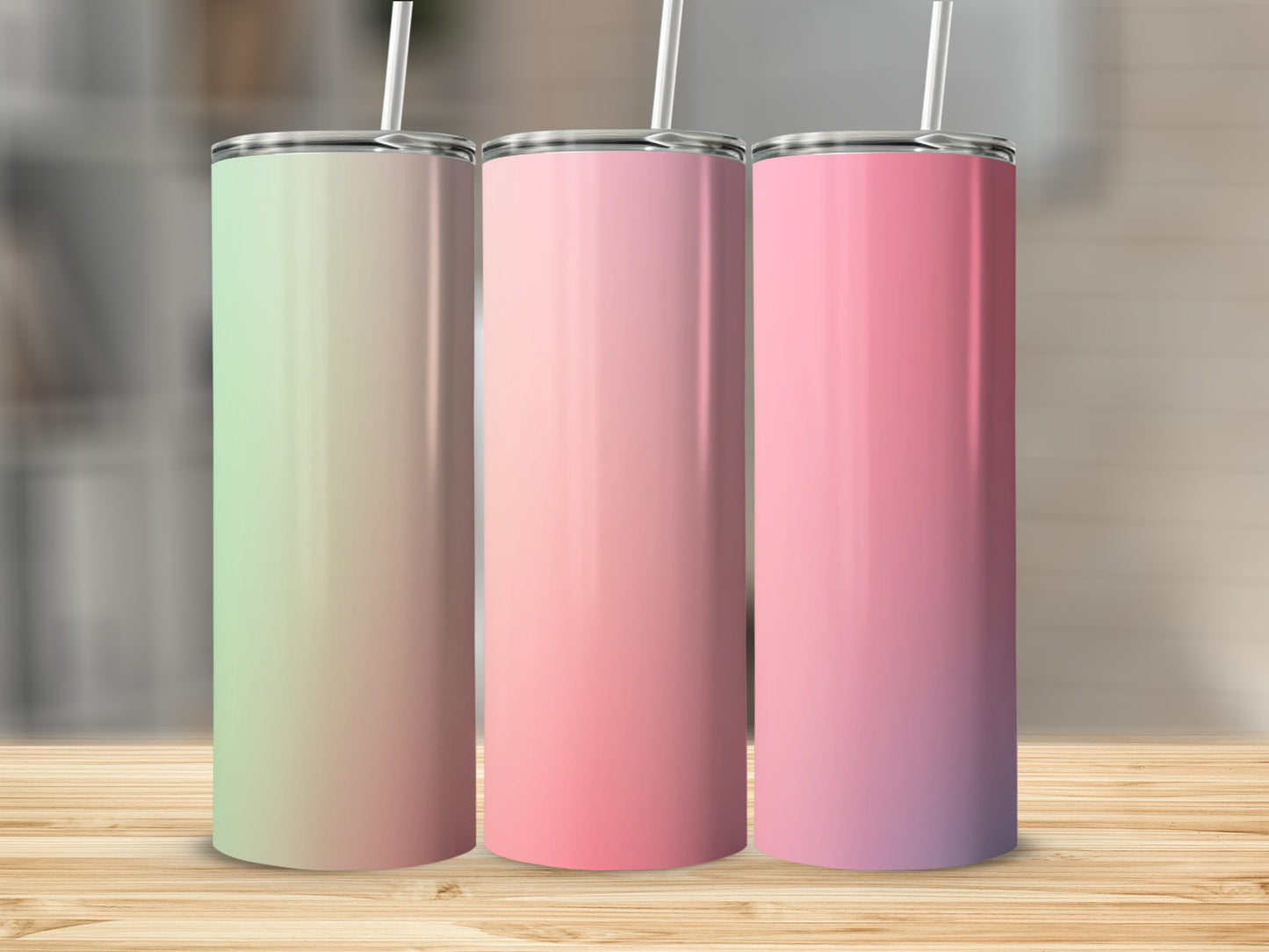 Three gradient tumblers with straws in pastel green, pink, and purple hues.