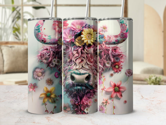 Floral Highland cow tumbler with pink and yellow flowers.