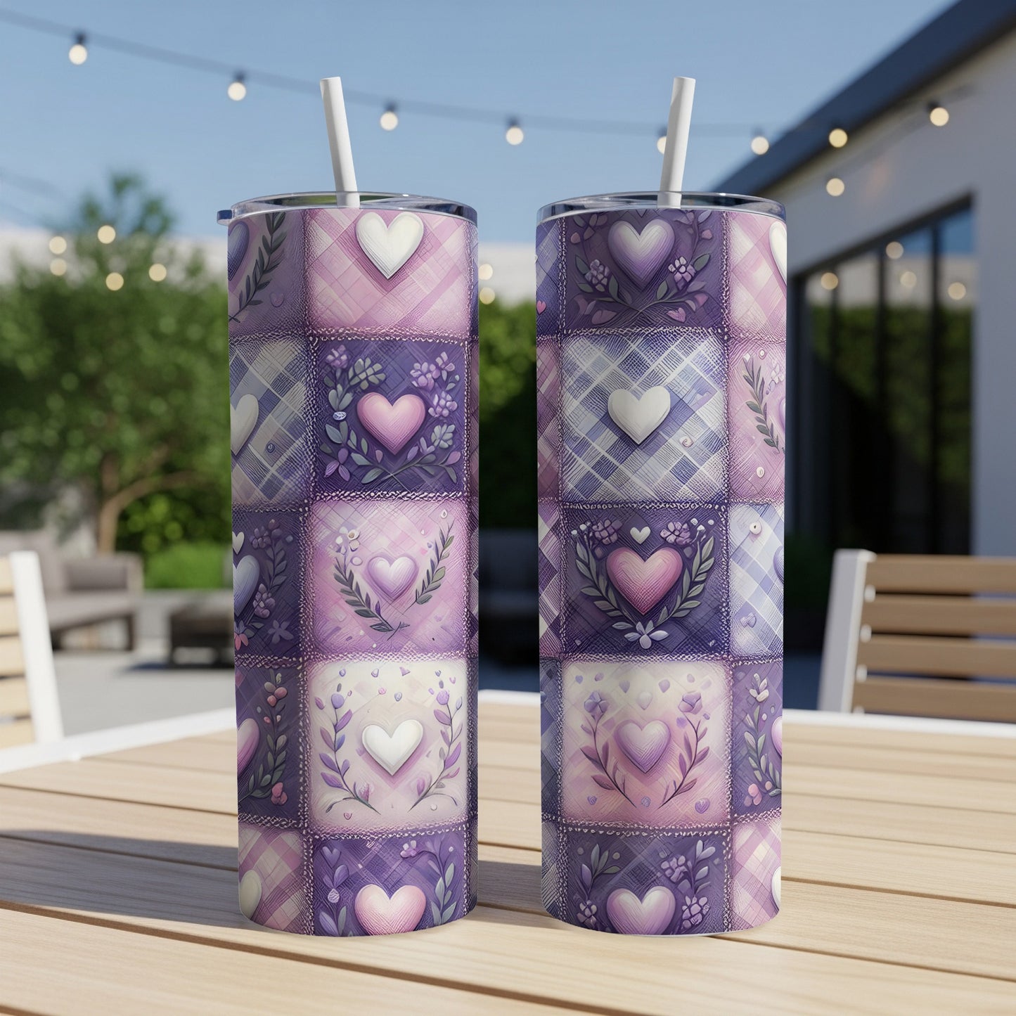 Two tall tumblers with purple, pink, and white patchwork heart pattern.