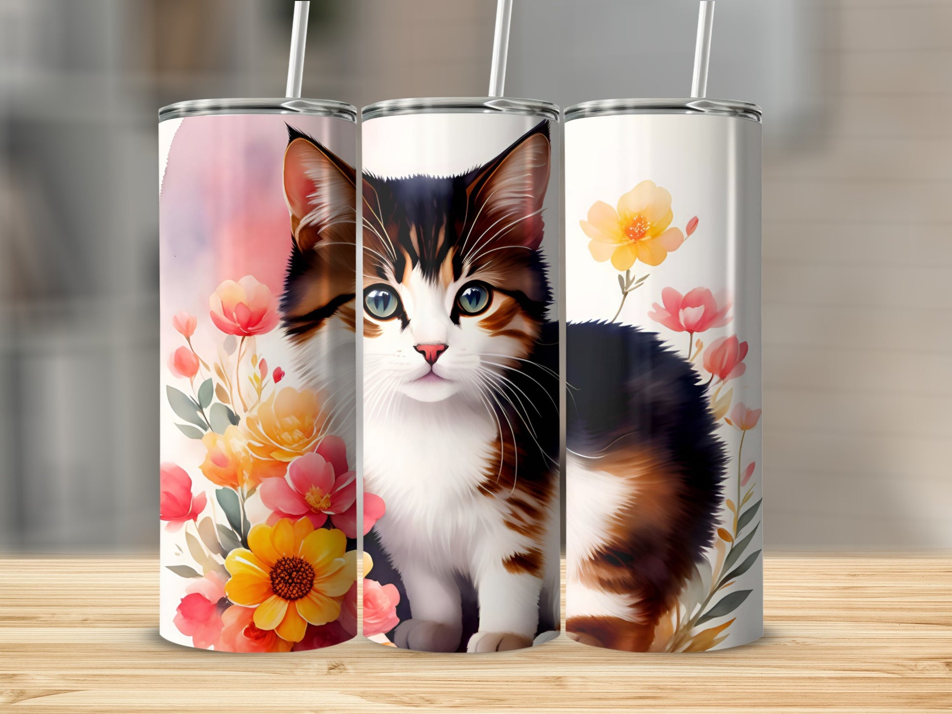 Tabby cat with blue eyes surrounded by watercolor flowers on a tumbler.