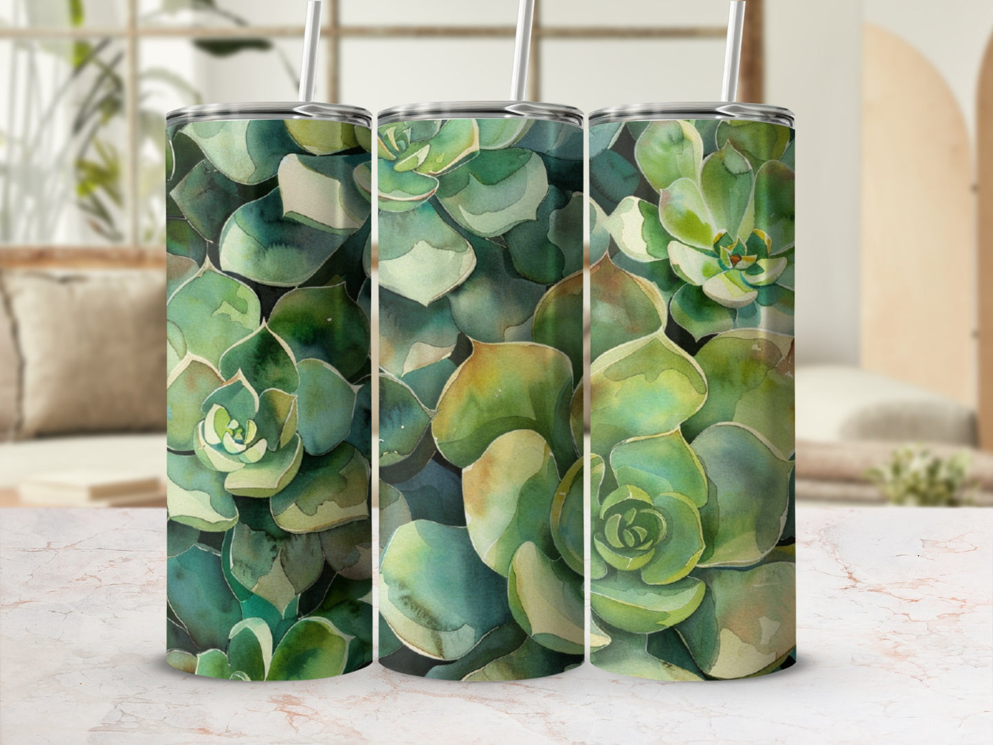 Triptych of tumblers featuring watercolor succulent pattern.