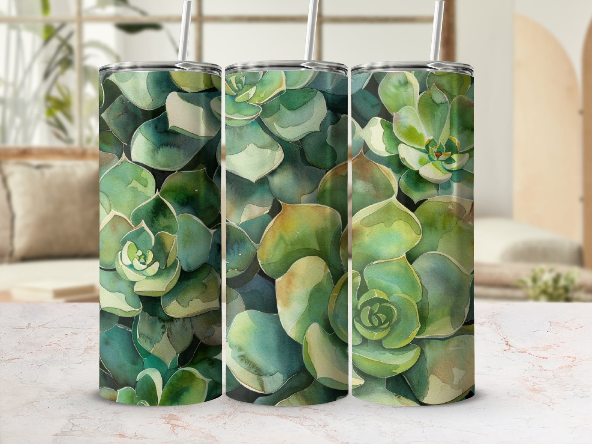 Triptych of tumblers featuring watercolor succulent pattern.