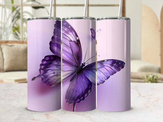 Three purple butterfly tumblers with straws on a marble countertop.