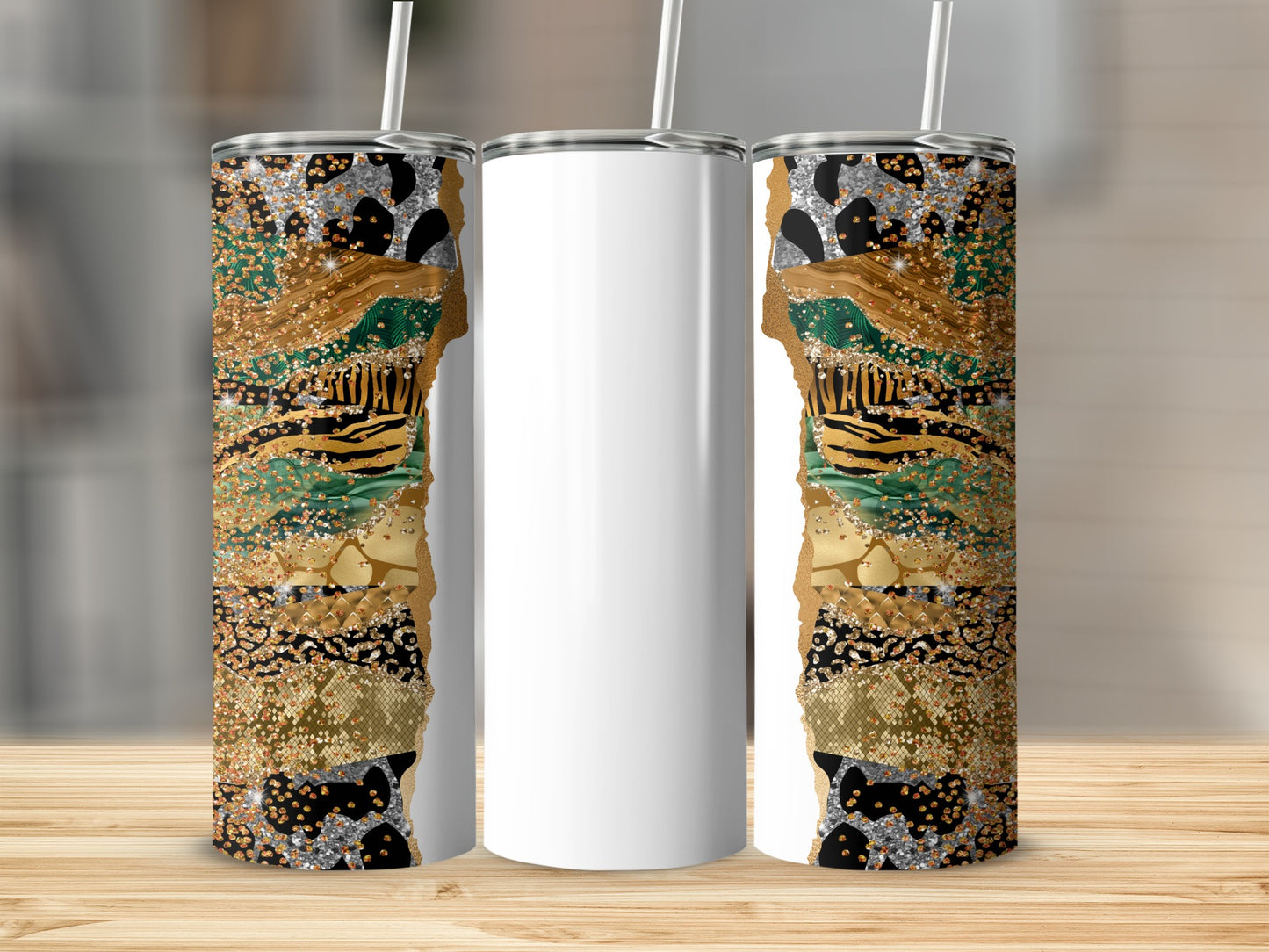 White tumbler with gold, black, and animal print patterned wrap on a wooden surface.