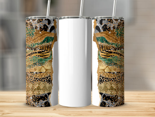 White tumbler with gold, black, and animal print patterned wrap on a wooden surface.