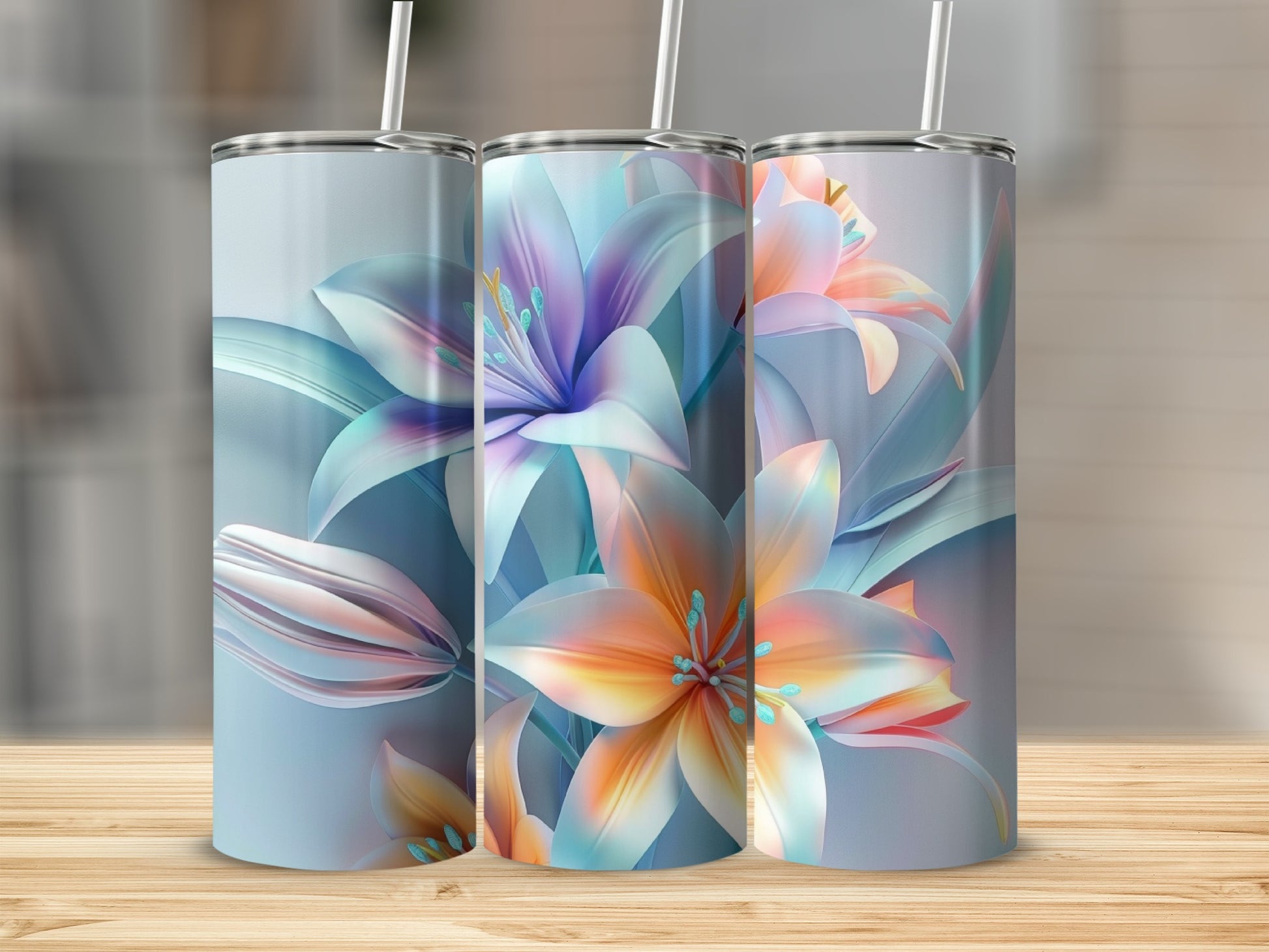 Three tumblers with abstract floral art in blues, purples, and oranges.