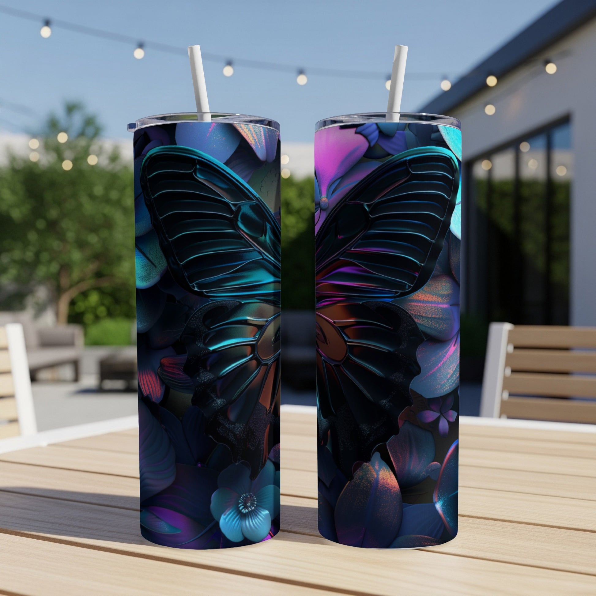 Two tall tumblers with a vibrant butterfly and floral design.