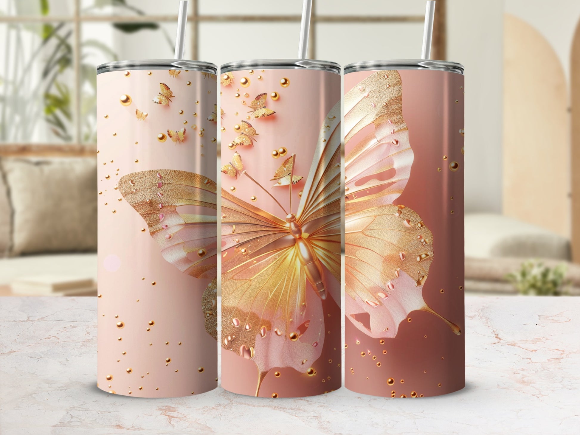 Pink tumbler with large golden butterfly and gold speckles.