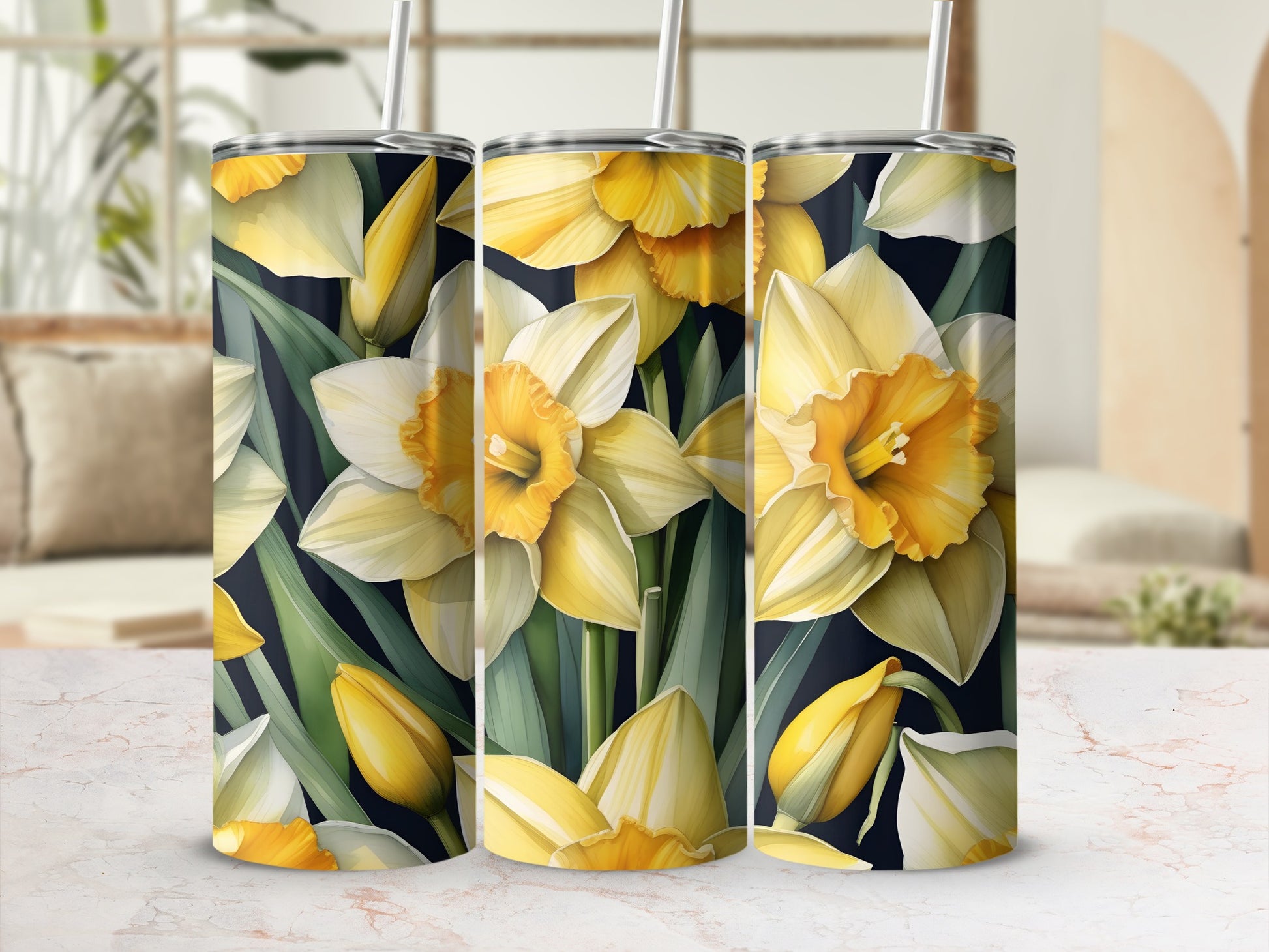 Three tumblers with a yellow daffodil floral pattern.