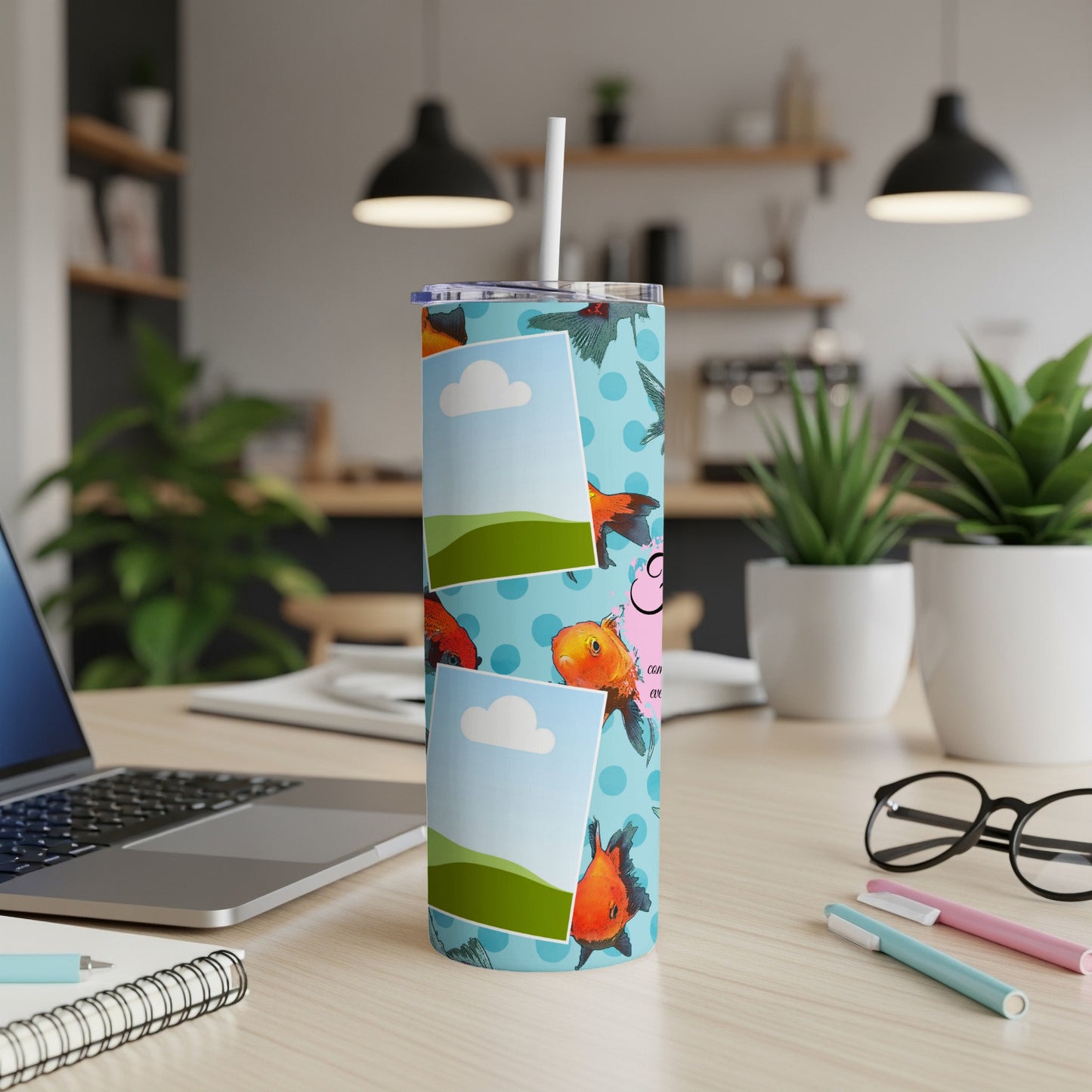 Blue tumbler with cartoon goldfish and cloud print, featuring photo frames.