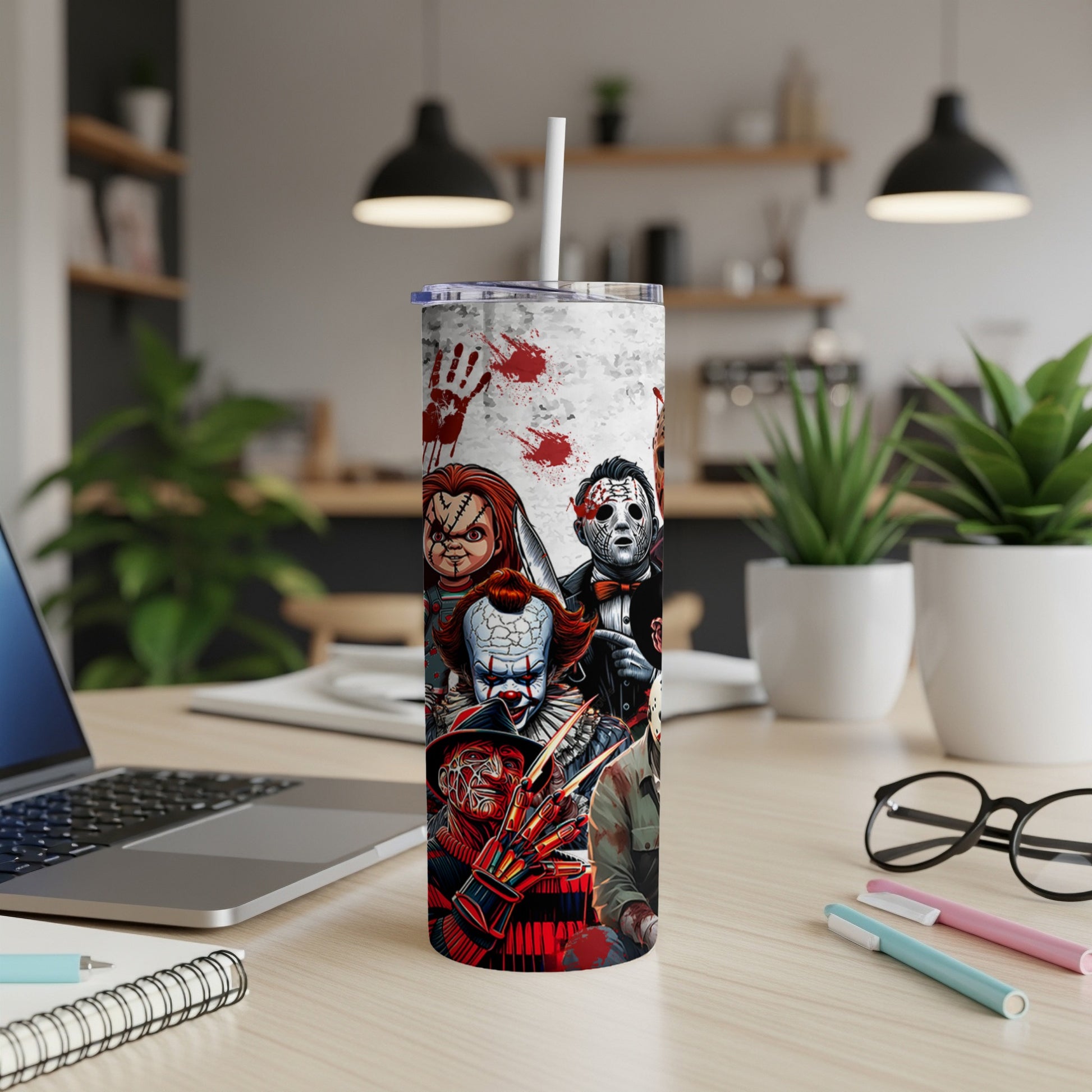 Horror characters Chucky, Pennywise, and Freddy Krueger on a white tumbler.