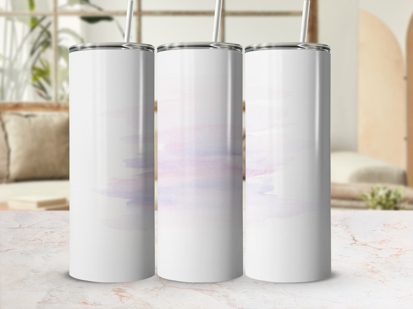 Three white tumblers with abstract pastel watercolor streaks.