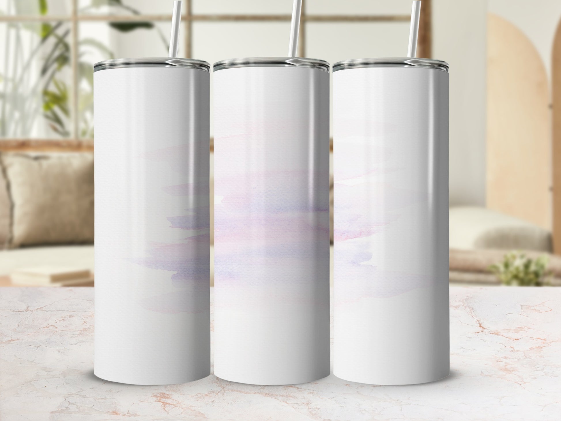 Three white tumblers with abstract pastel watercolor streaks.