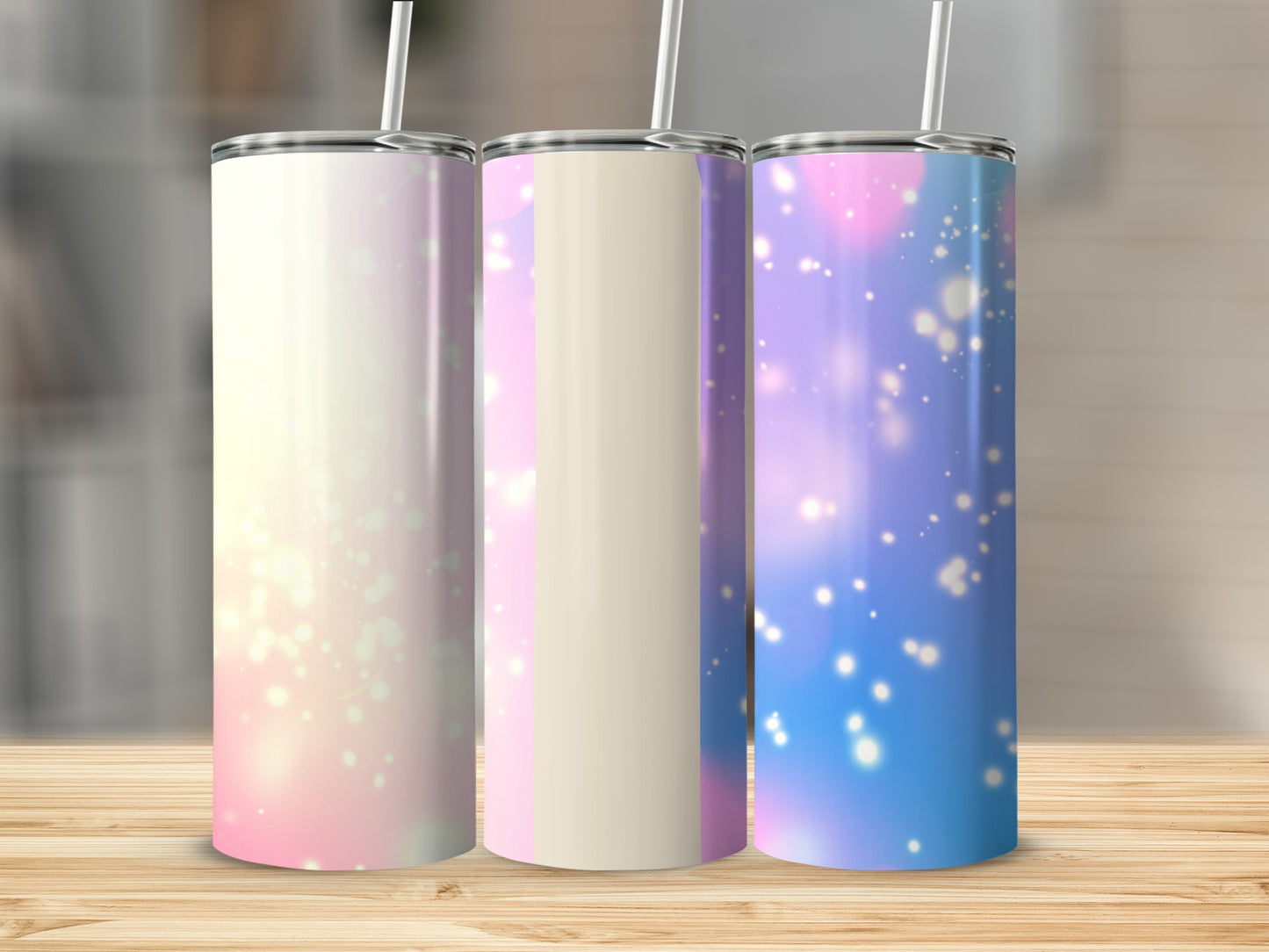 Three tumblers with pastel gradients and bokeh light effects.