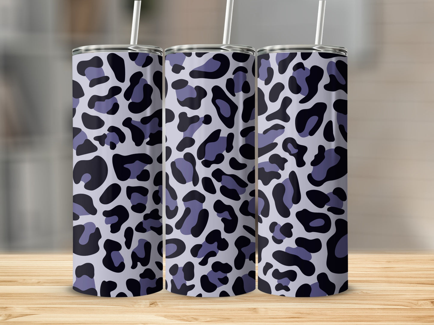 Three tumblers with gray, purple, and black leopard print design.