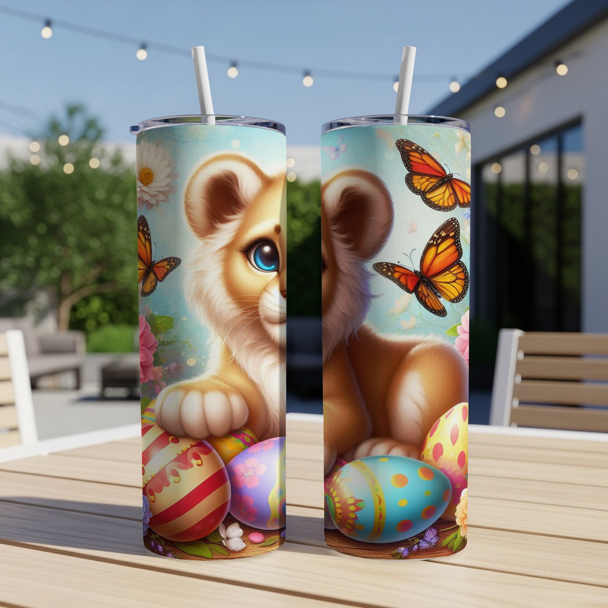 Cute lion cub with butterflies and colorful Easter eggs on a tumbler.