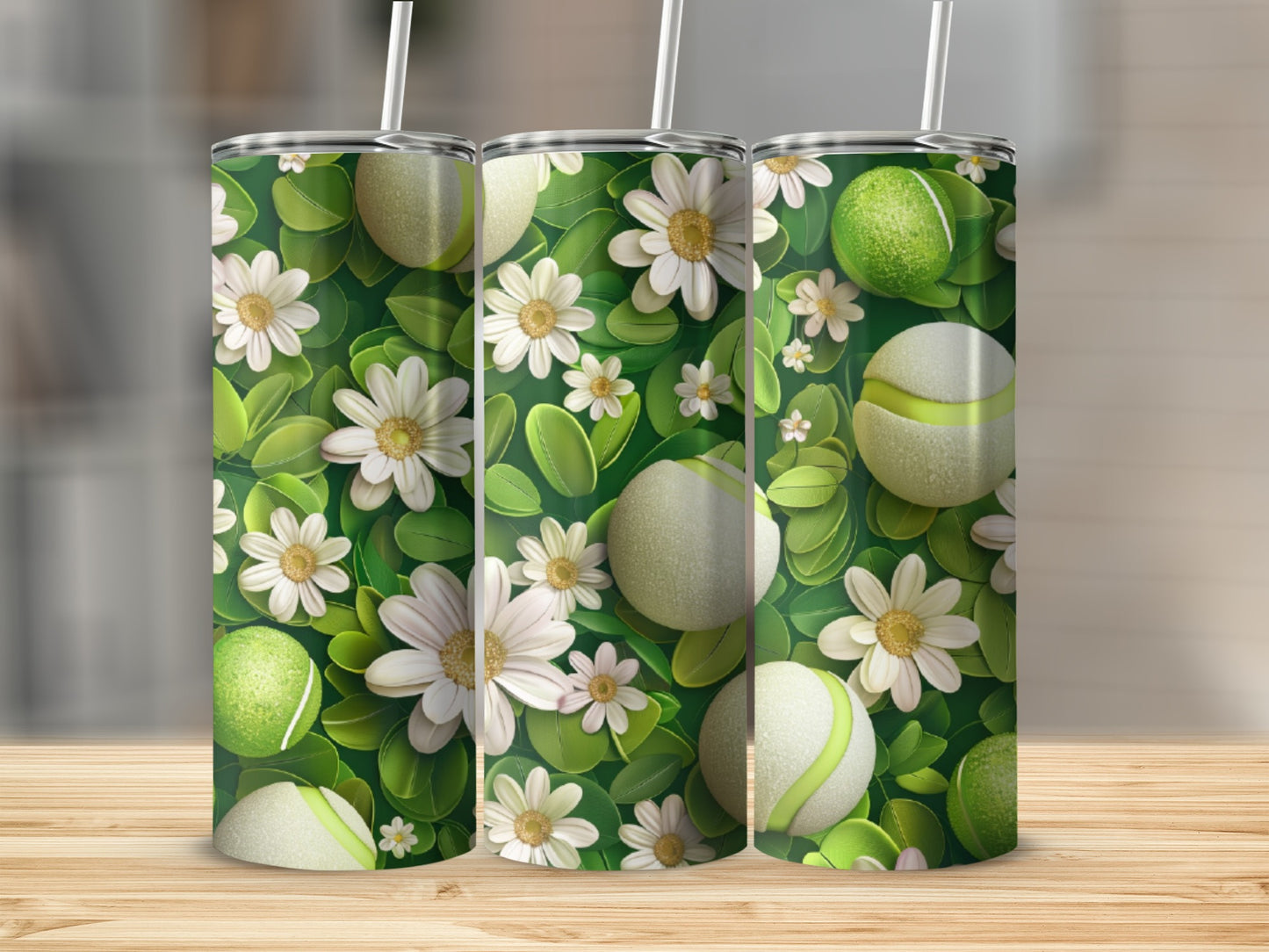 Three tumblers with a green leaf and white flower pattern.