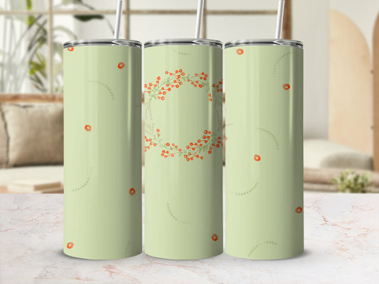Pale green tumblers with red berry wreath and branch accents.
