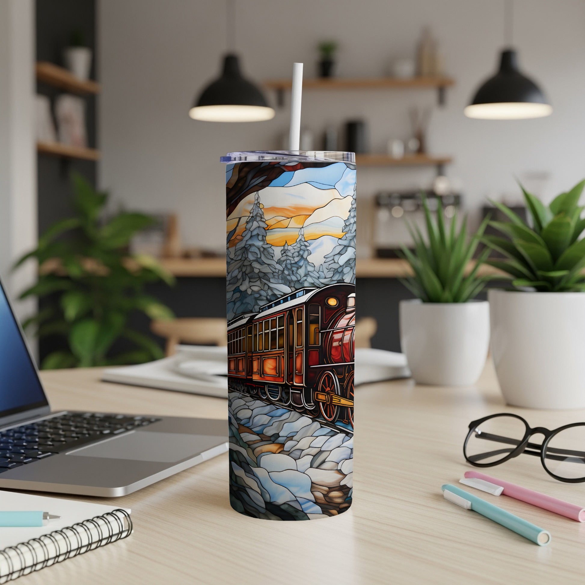 Train in stained glass style on a skinny tumbler with laptop and pens.