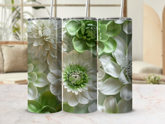 Three floral tumblers with white and green petals and straws.