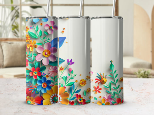 Three tumblers decorated with vibrant, colorful floral patterns.