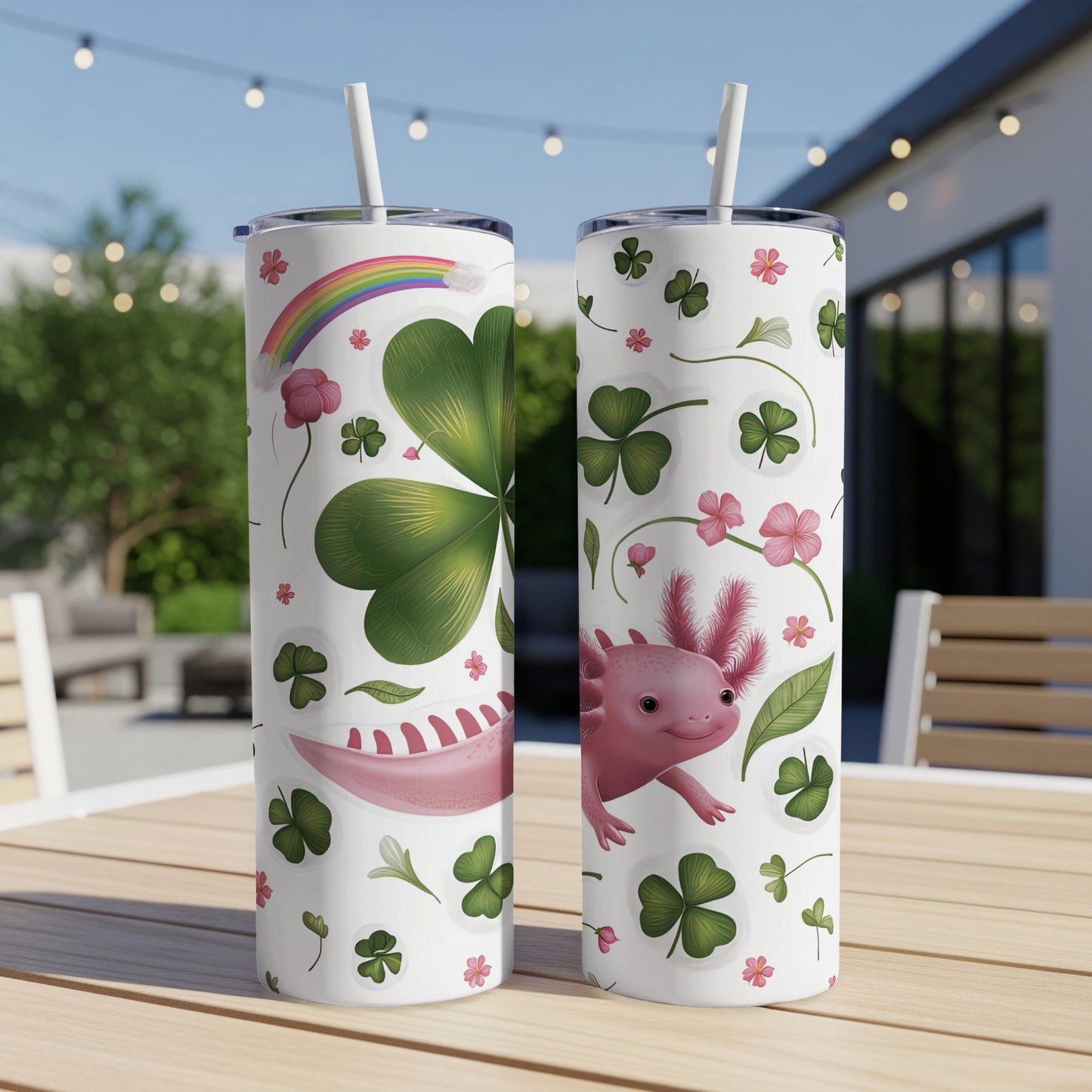 Two tumblers with axolotl, shamrocks, and rainbow design.