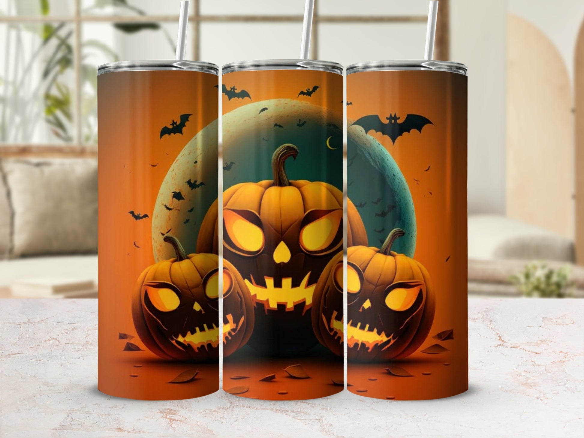 Three tumblers feature a spooky Halloween design with jack-o'-lanterns and bats.