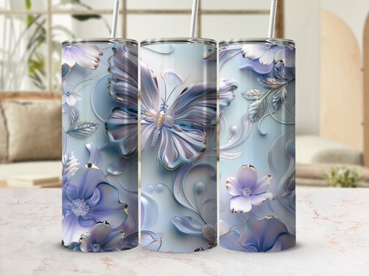 Three tumblers with floral and butterfly designs in blue and purple.