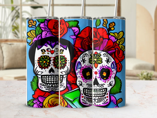Sugar skull tumblers with vibrant floral accents.