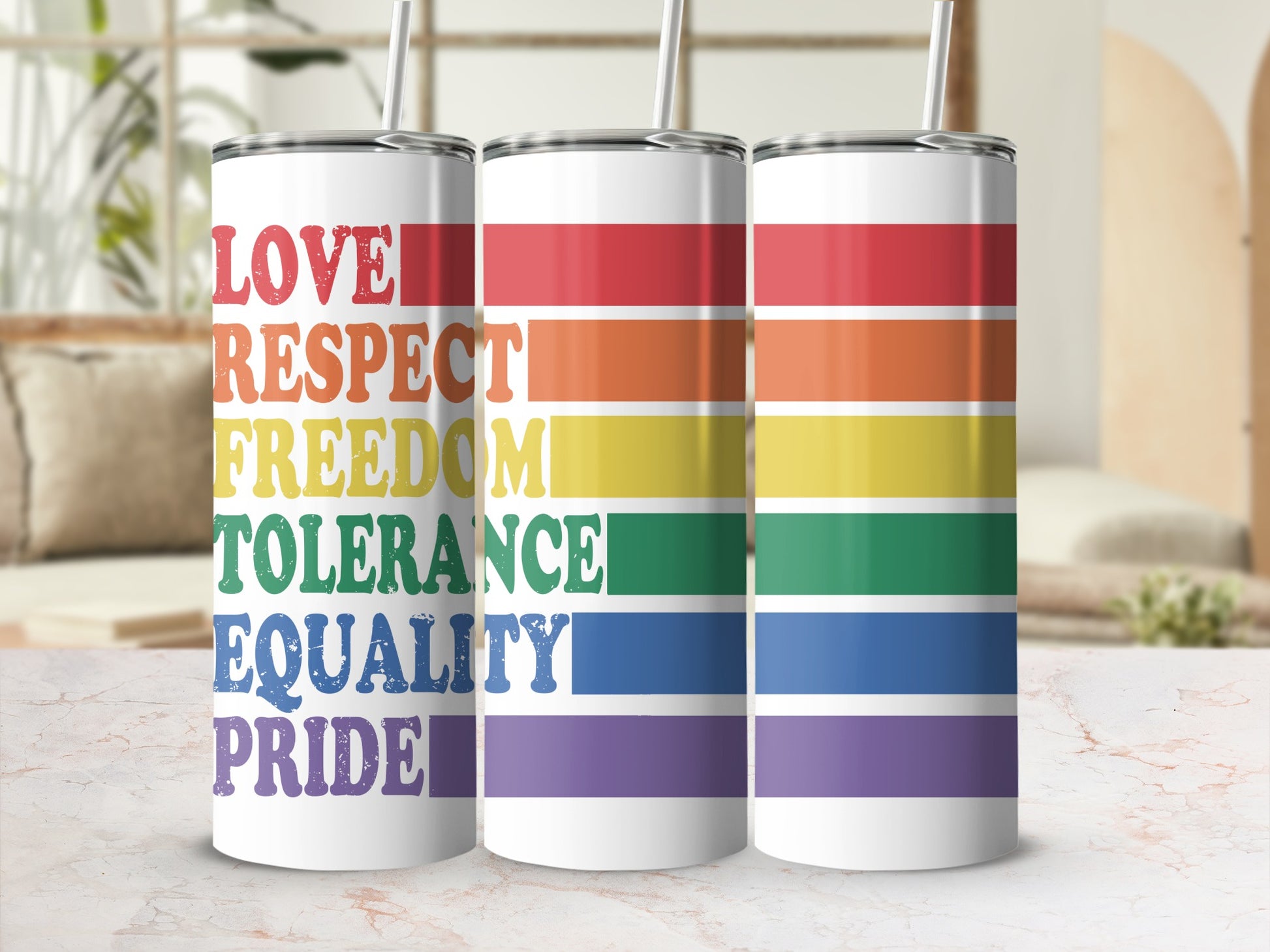 Rainbow tumbler with "love, respect, freedom, tolerance, equality, pride" text.
