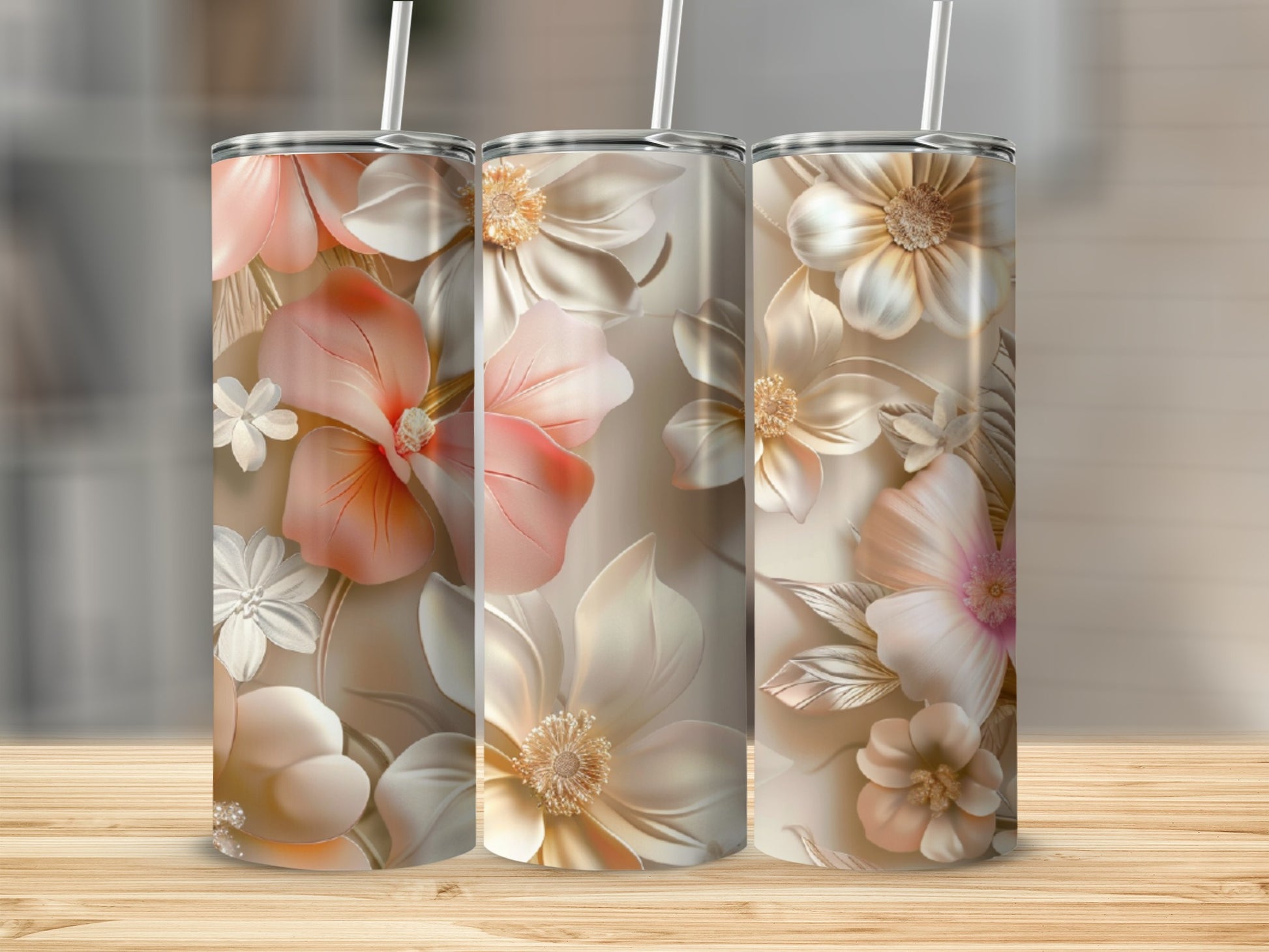 Three tumblers with a pale pink and cream floral embossed design.
