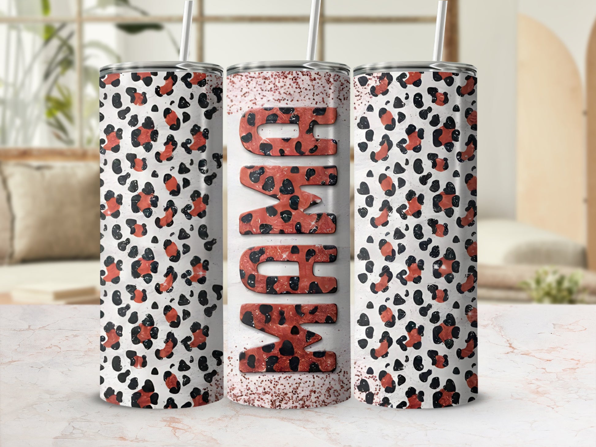 Leopard print tumbler with "MOM" in large red letters.