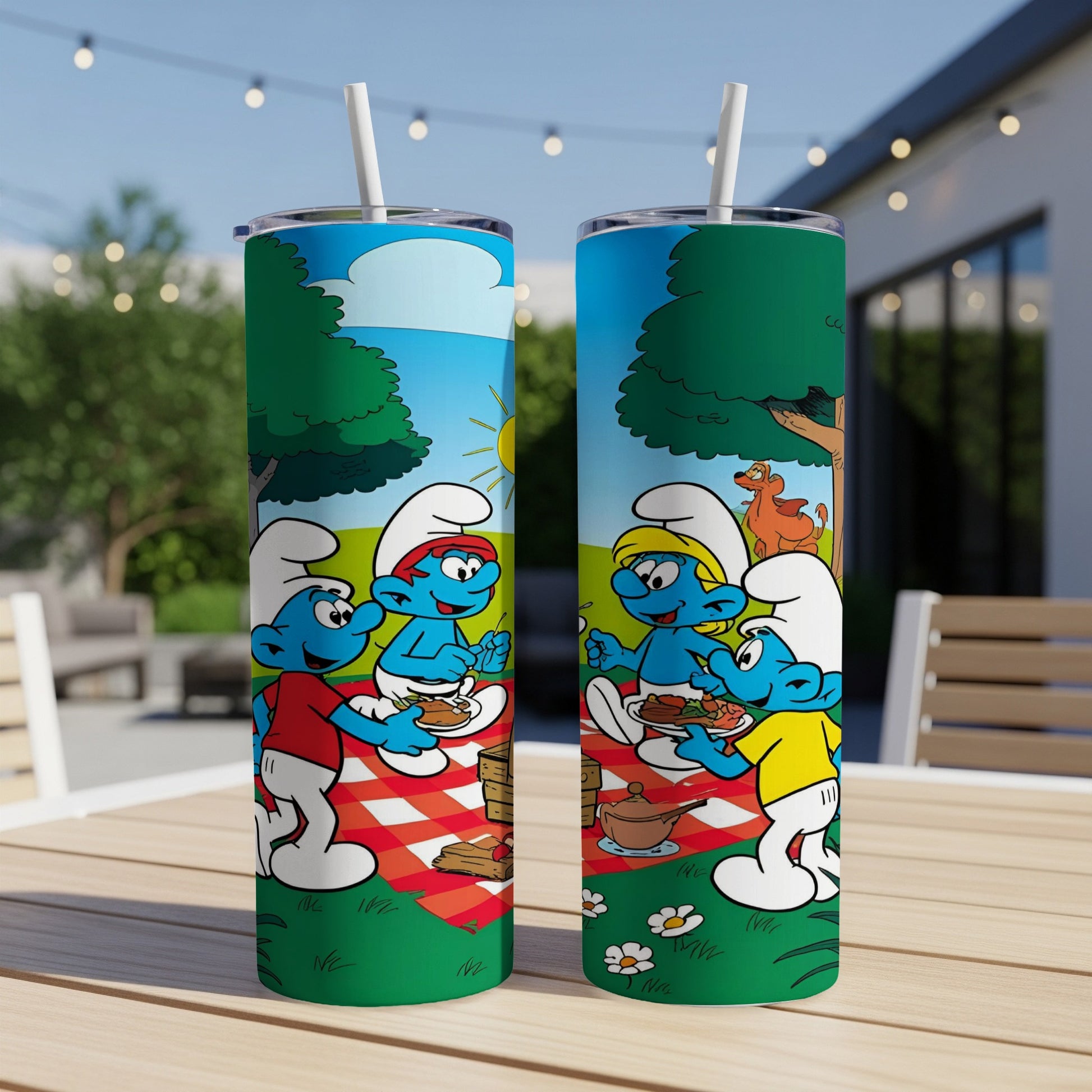 Smurfs having a picnic on a checkered blanket outdoors with trees and a brown dog.