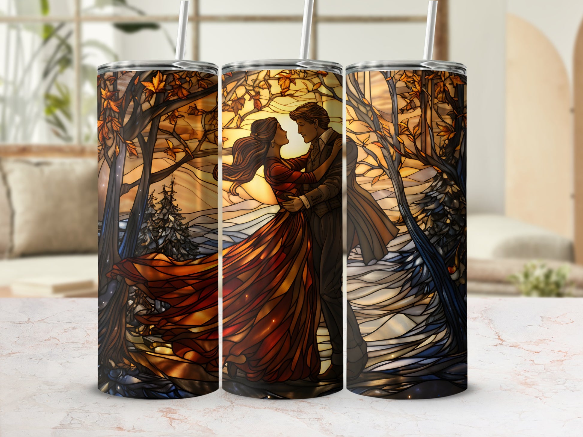 Couple dancing in autumnal forest scene on three tumblers.