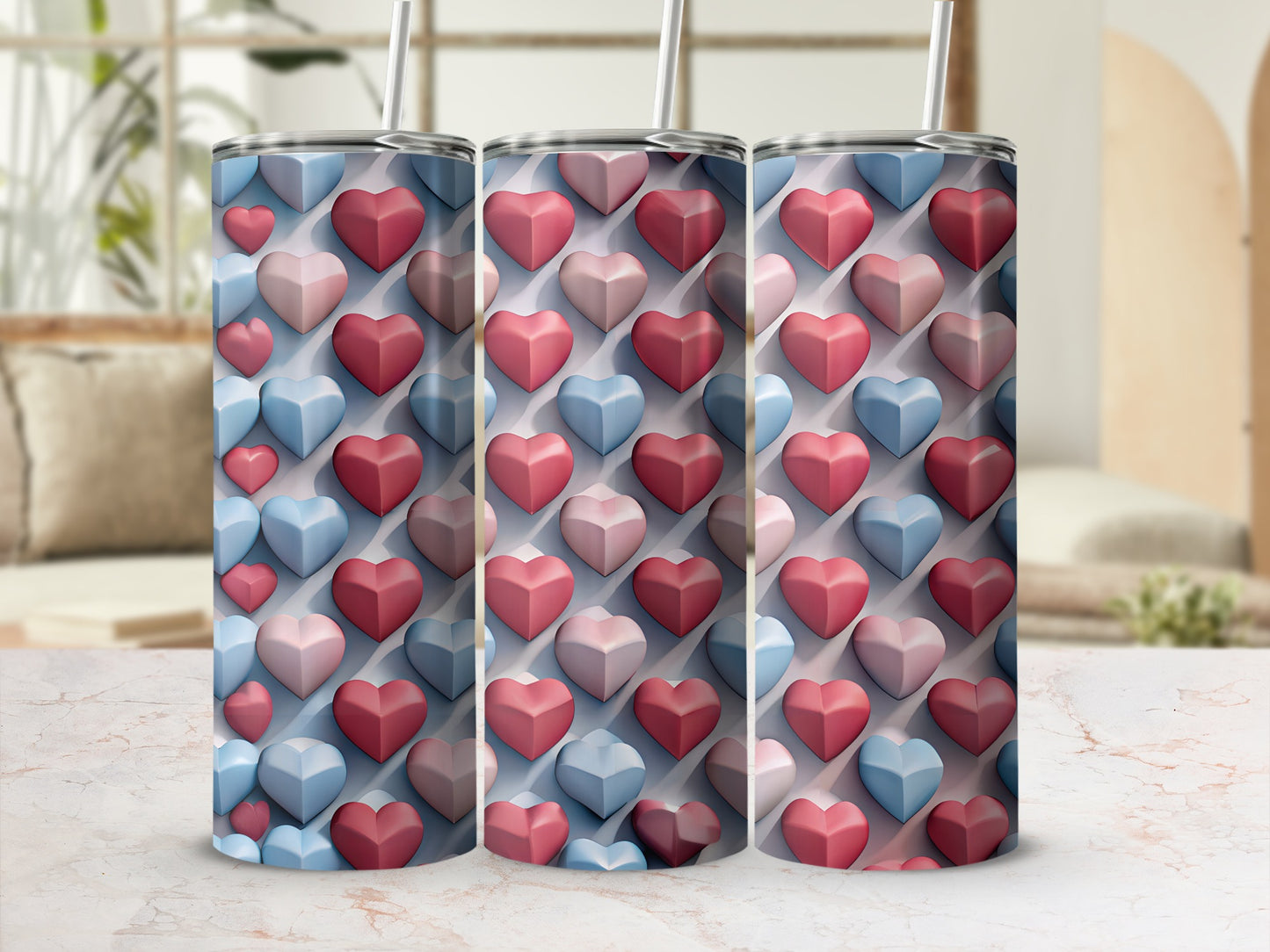 Three tumblers adorned with a repeating pattern of pink and blue hearts.