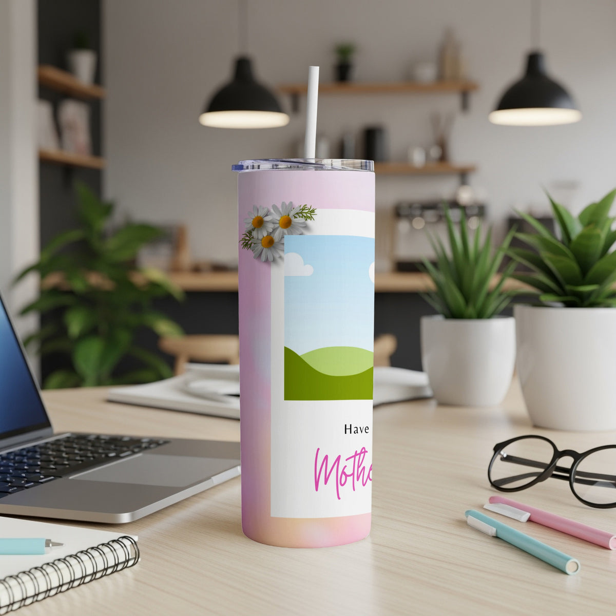 Pink iridescent tumbler with daisies, a landscape photo frame, and "Have a Mother's Day" text.
