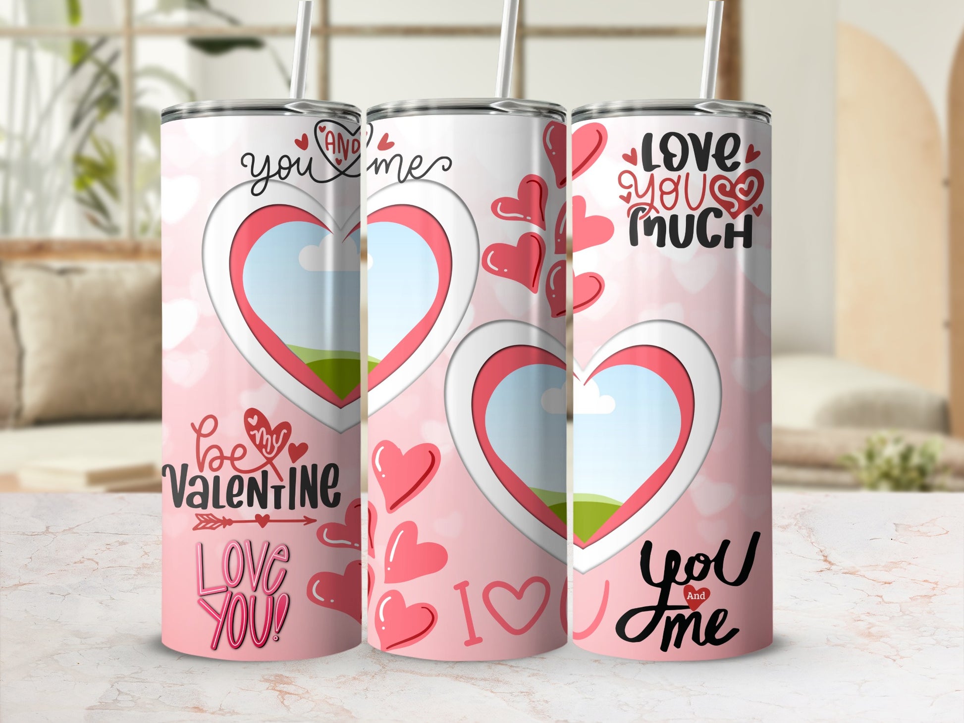 Three Valentine's Day themed tumblers with hearts and romantic text.