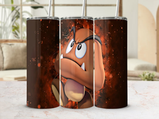 Brown Goomba character from Super Mario with fiery orange background on a tumbler.