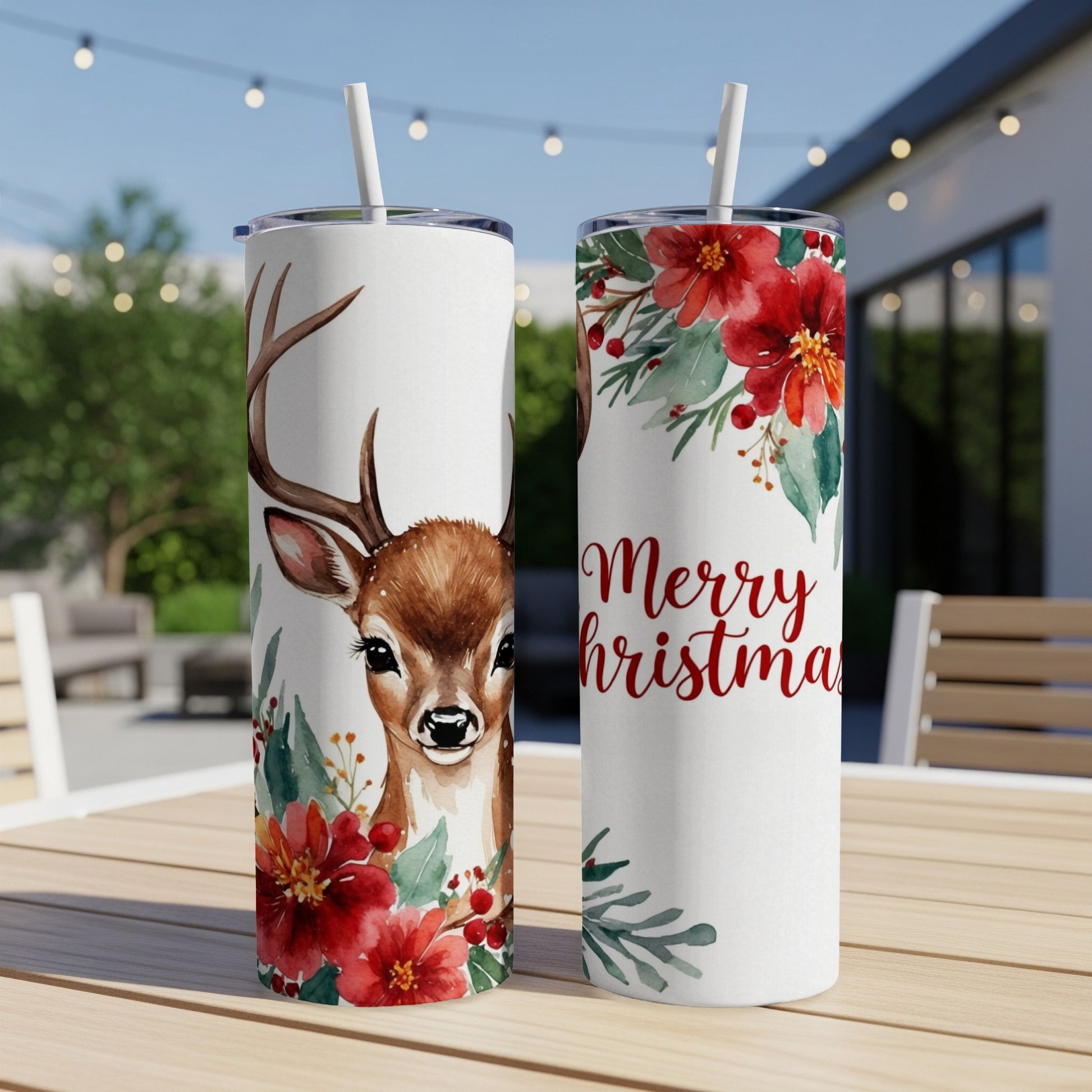 Two tumblers with deer and red floral Christmas design.