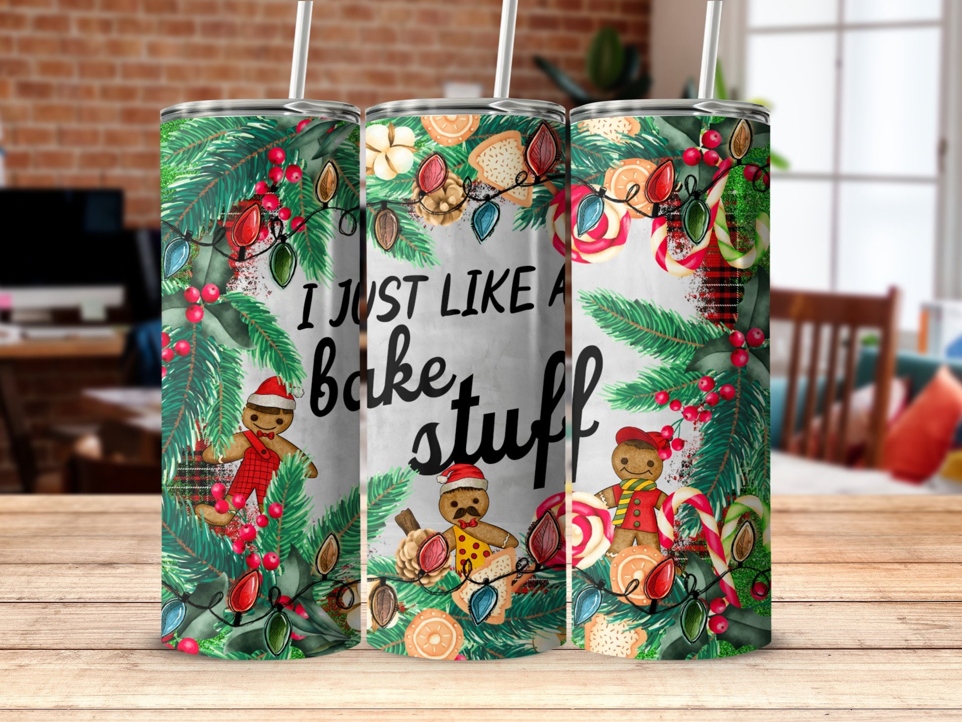 Christmas tumbler with gingerbread men, candy canes, and berries.