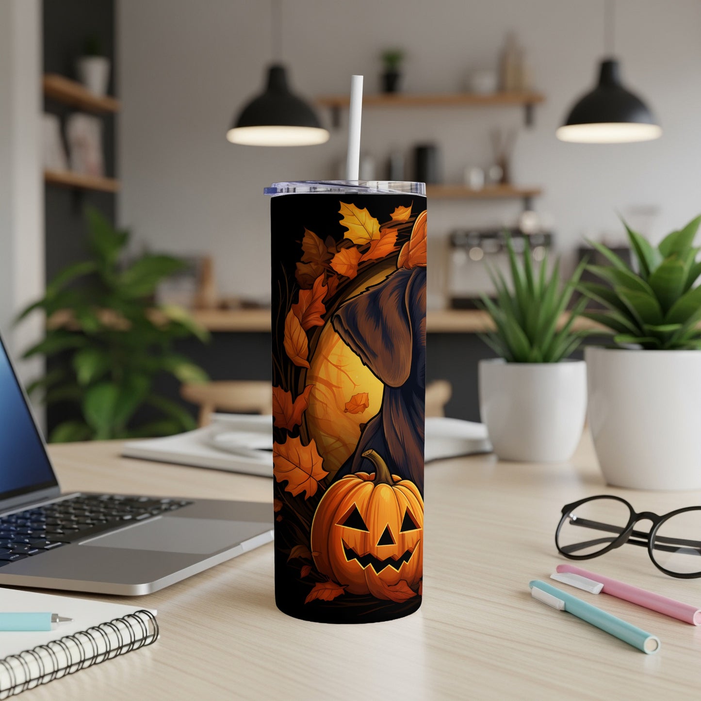 Black tumbler with jack-o'-lantern and fall leaves, featuring a dog's profile.