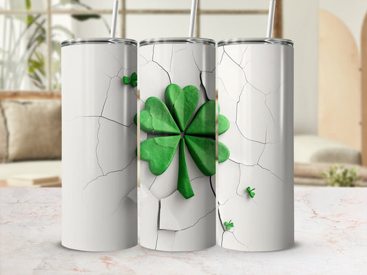 Three white tumblers with cracked surface design and green shamrocks.