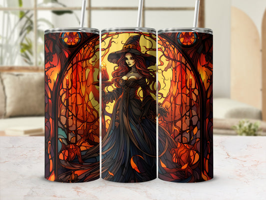 Stained glass design featuring a witch holding a candle, with pumpkins and ornate frames.