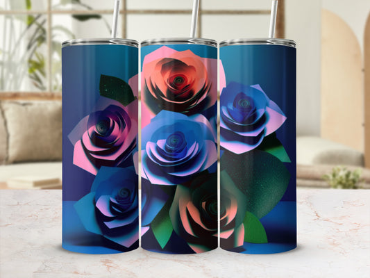 Three tumblers with colorful rose designs and straws.