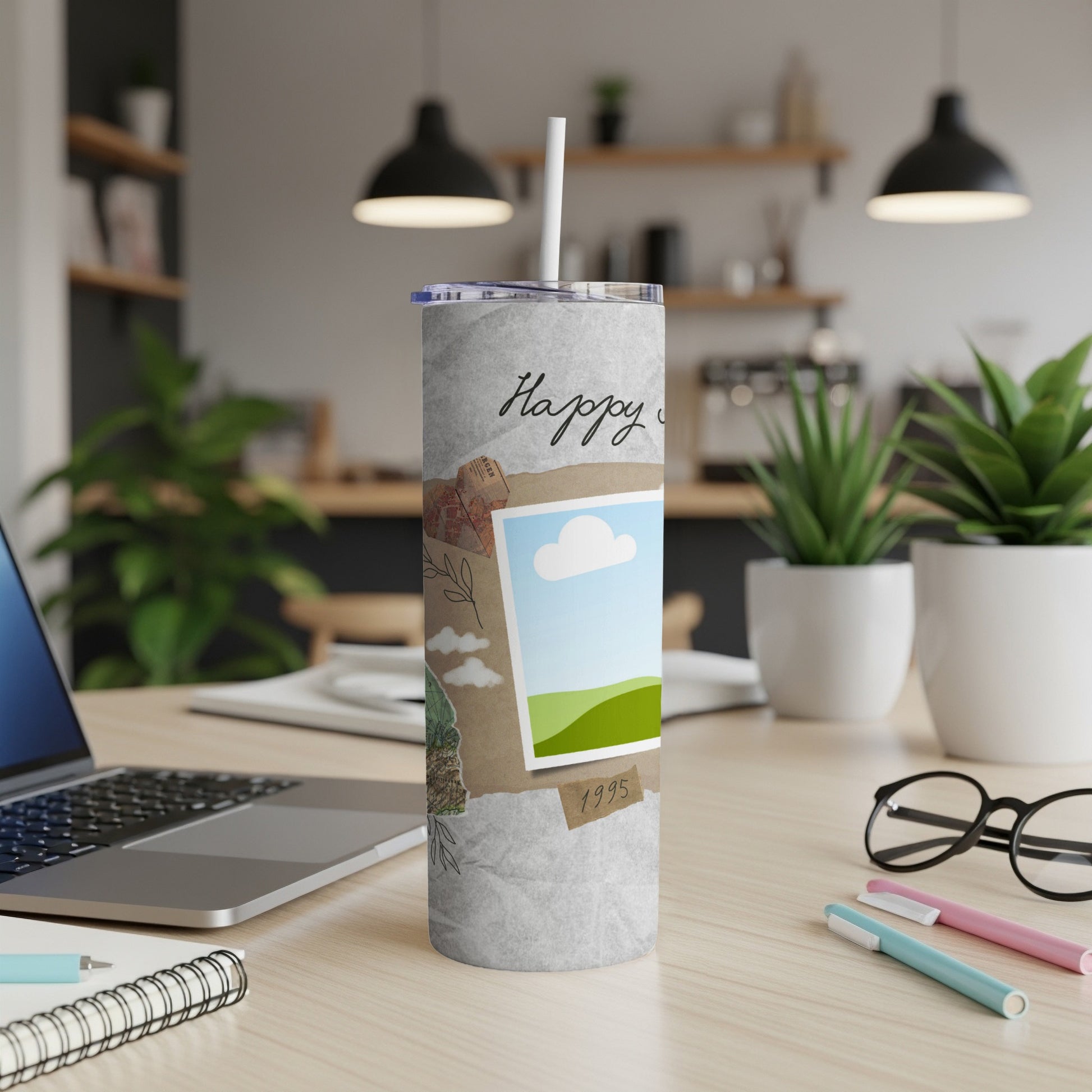 Grey tumbler with a collage design, a photo frame, and "Happy" text.