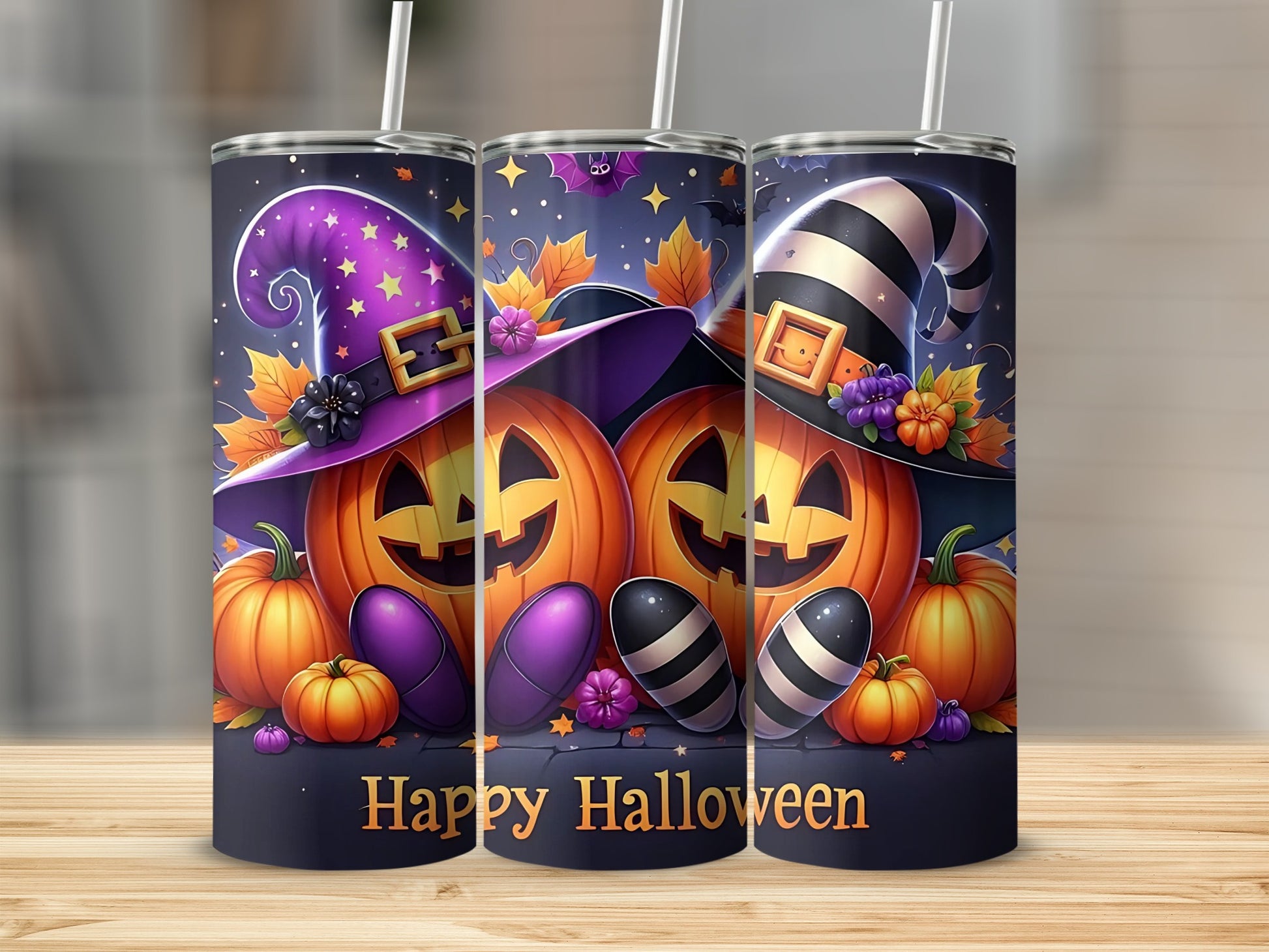 Three tumblers with Halloween theme: pumpkins, bats, and witch hats.