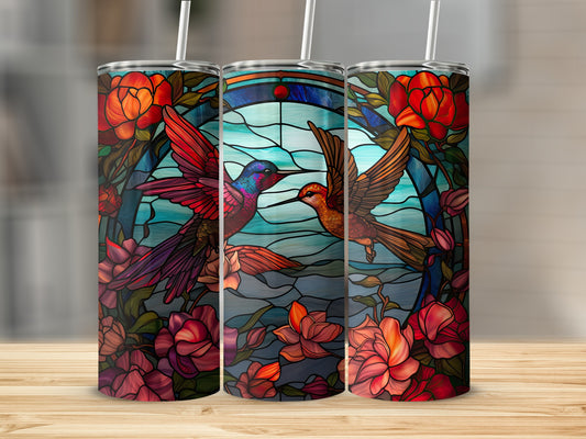 Three stained-glass tumblers featuring hummingbirds and flowers.