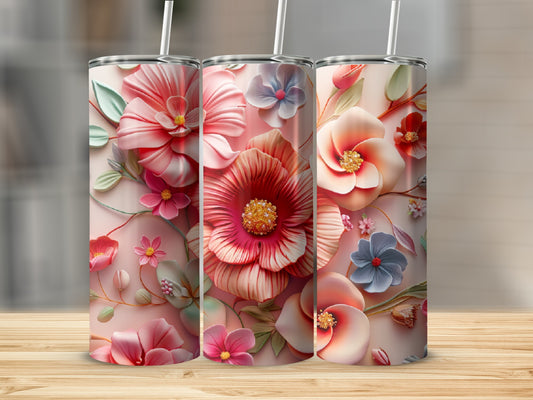 Three tall tumblers with raised floral designs in pink, coral, and blue.